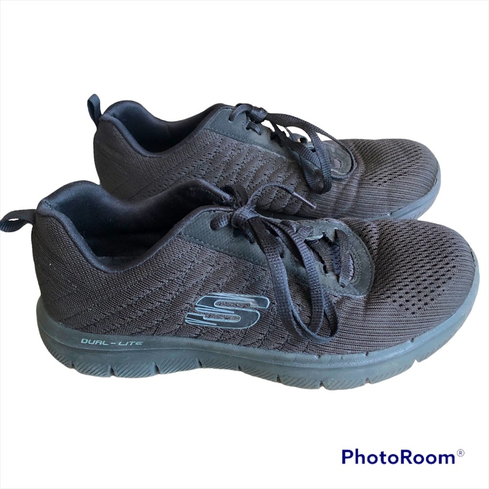 Skechers women’s black sneakers size 7